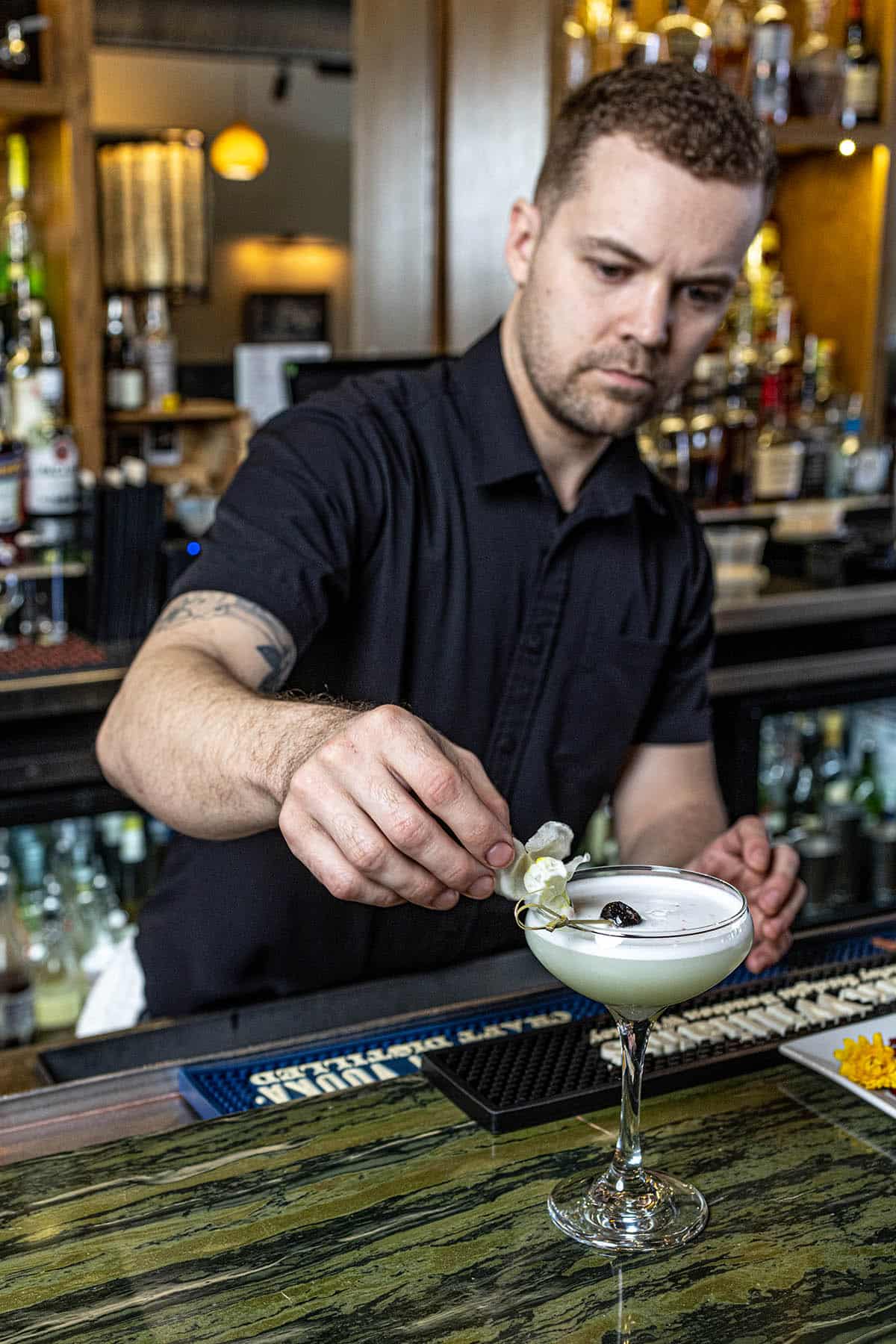 bartender making a cocktail